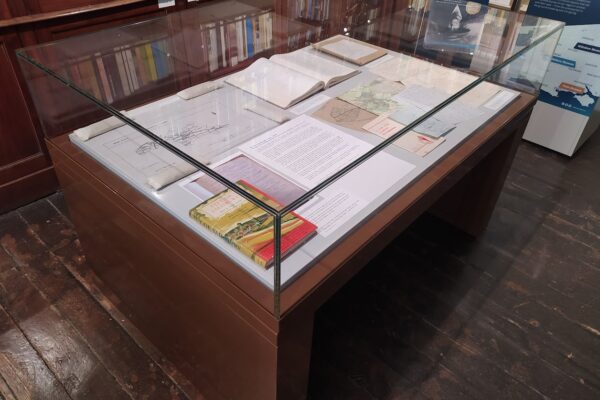 Glass-topped display case containing research papers of Dr Pamela Gough.